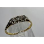 18ct gold diamond set trilogy ring, size L, 1.6g. P&P Group 1 (£14+VAT for the first lot and £1+