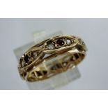 9ct gold eternity ring set with garnet and cubic zirconia, size N, 2.7g. P&P Group 1 (£14+VAT for