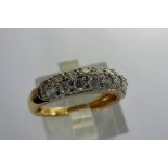 18ct gold half eternity ring set with two rows of cubic zirconia, size L/M, 2.5g. P&P Group 1 (£14+