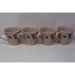 Four Belleek Shamrock mugs, H: 90 mm, no cracks or chips. P&P Group 2 (£18+VAT for the first lot and