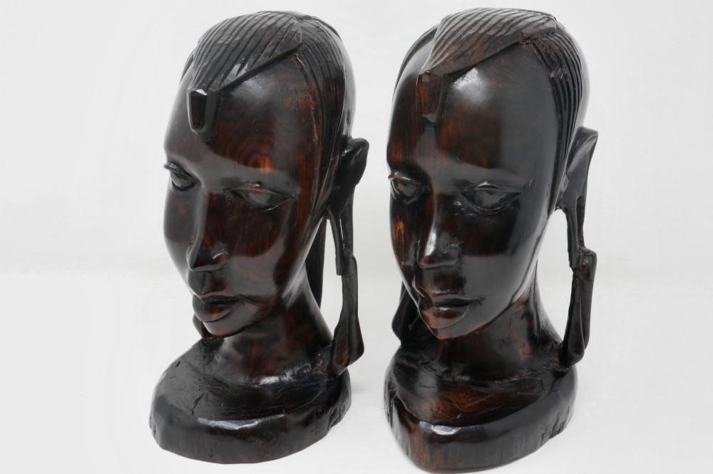 Pair of African carved native heads, H: 24 cm. P&P Group 3 (£25+VAT for the first lot and £5+VAT for