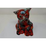 Anita Harris sitting dog, signed in gold, H: 16 cm, no cracks or chips. P&P Group 1 (£14+VAT for the