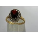 9ct gold cluster ring set with garnet and cubic zirconia, size J, 2.2g. P&P Group 1 (£14+VAT for the