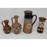 Doulton Lambeth: four pieces comprising three jugs and a vase, largest H: 21 cm, losses to rims on