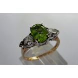 9ct gold trilogy ring set with emerald and cubic zirconia, size L, 3.0g. P&P Group 1 (£14+VAT for