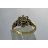 9ct gold cluster ring set with diamonds, size K, 1.8g. P&P Group 1 (£14+VAT for the first lot and £