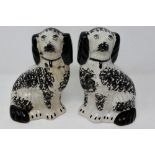 Pair of 19th Century Staffordshire spaniels, H: 18 cm, crack to one crazing and signs of age