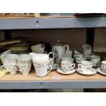 Shelf of mixed ceramic including Royal Doulton, Colclough and Wedgwood. Not available for in-house