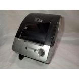 Brother P touch label printer, model QL500, takes DK rolls, with power supply and USB cable. P&P