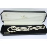 Boxed Lotus double strand pearl necklace with a 925 silver gilt clasp, L: 44 cm. P&P Group 1 (£14+