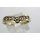 9ct gold wishbone ring set with cubic zirconia, size O, 1.9g. P&P Group 1 (£14+VAT for the first lot