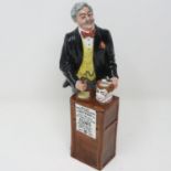 Royal Doulton figurine, The Auctioneer, no cracks or chips, H: 23 cm. P&P Group 1 (£14+VAT for the