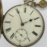 Hallmarked silver cased key wind pocket watch, working at lotting. P&P Group 2 (£18+VAT for the