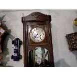 Oak cased chiming wall clock, H: 63 cm. Not available for in-house P&P