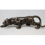 Bronzed cast iron stalking panther, L: 40 cm. P&P Group 3 (£25+VAT for the first lot and £5+VAT