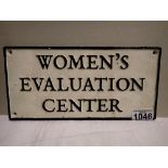 Cast iron Womens Evaluation Centre wall sign, L: 27 cm. P&P Group 2 (£18+VAT for the first lot