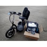 Veleco 2T16 invalid carriage with charger and key working at lotting with a box of accessories to