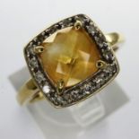 9ct gold ring with square cut citrine surrounded by diamonds, size P, 2.5g. UK P&P Group 1 (£16+