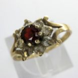 9ct gold cluster ring set with garnet and cubic zirconia, size M, 1.6g. UK P&P Group 1 (£16+VAT