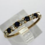 9ct gold ring set with sapphires and cubic zirconia, size N/O, 1.0g. UK P&P Group 0 (£6+VAT for