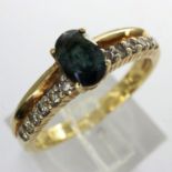 9ct gold ring set with green sapphire and diamonds, size Q, 3.5g. UK P&P Group 1 (£16+VAT for the