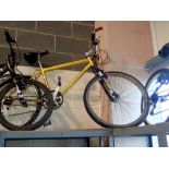 Gold mens mountain bike with 21 speed and 18 inch frame. Not available for in-house P&P