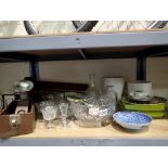 Shelf of mixed glass and ceramics and photographic lamp in case. Not available for in-house P&P