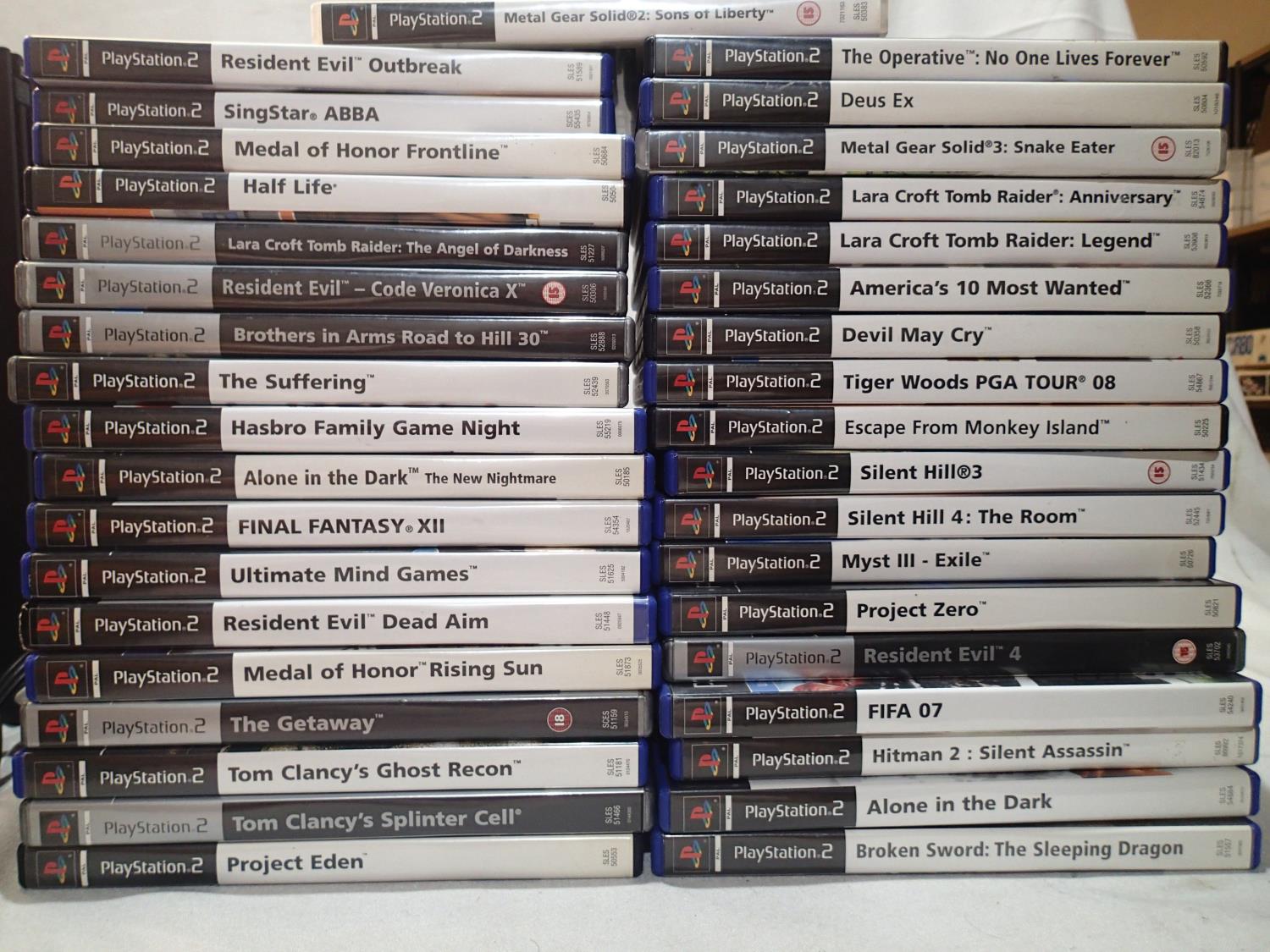 PlayStation 2 console with controller and leads, plus thirty seven games all complete with disc - Image 2 of 2