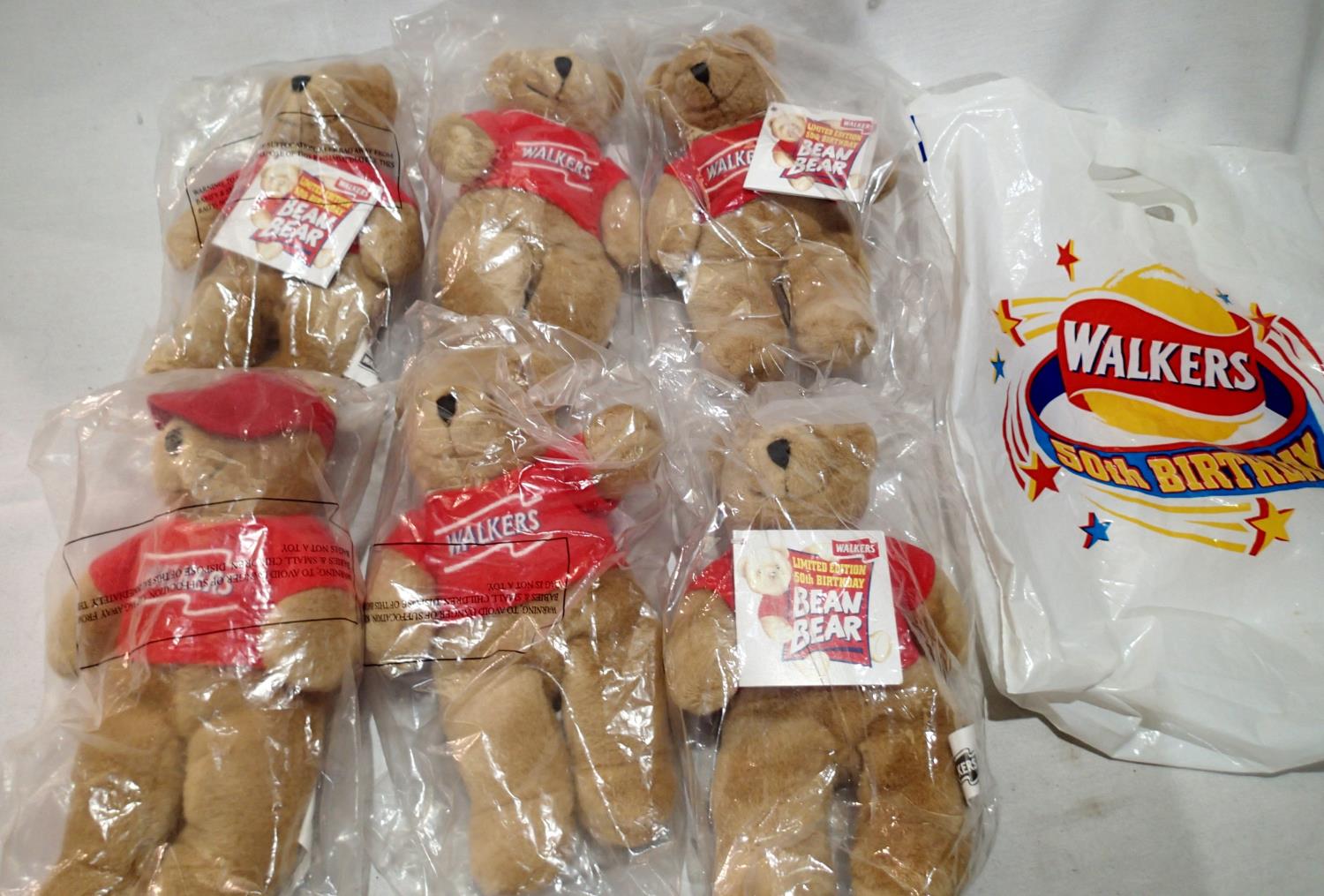 Six Walkers 50th anniversary bears all as new in packets, approximate H: 24 cm, also includes