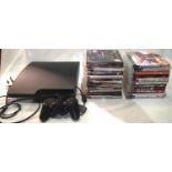 PS3 with controller and power lead plus twenty three games, all complete with disc and booklet. UK