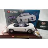 Corgi 95100 1/18 scale MGF appears as new, with plinth, badge and accessory pack, box has wear. UK