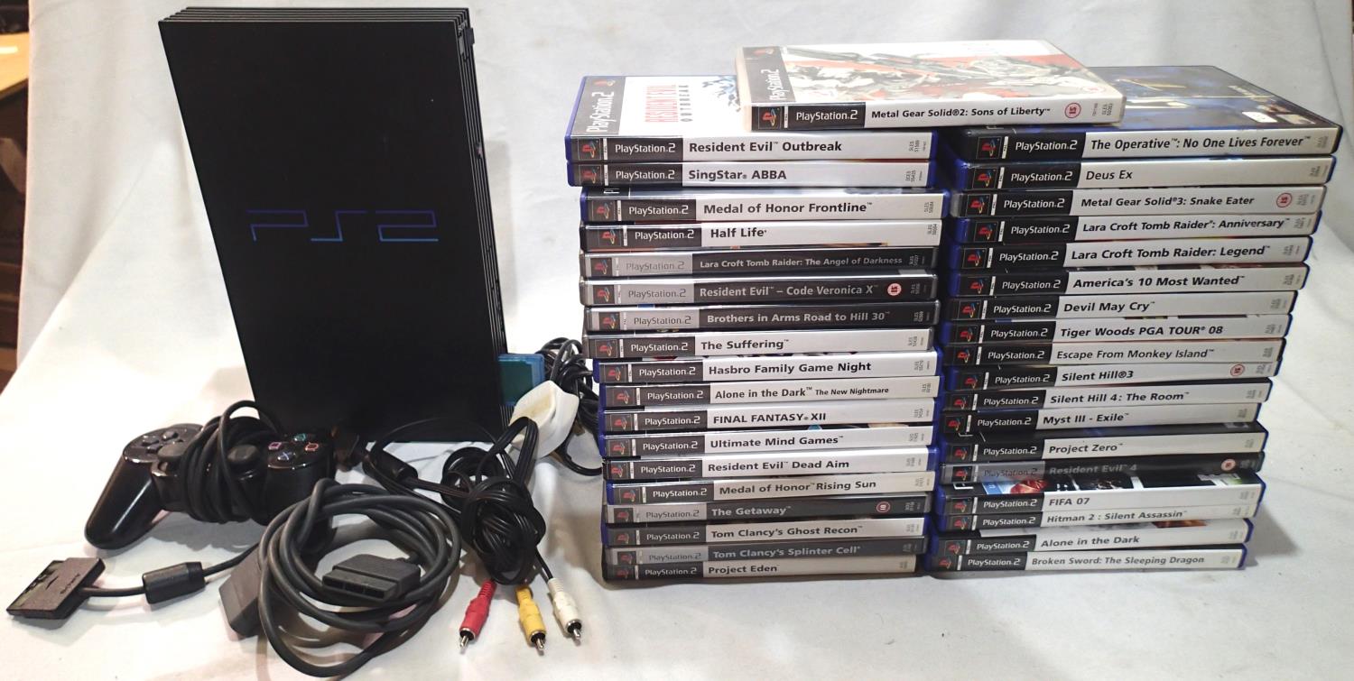 PlayStation 2 console with controller and leads, plus thirty seven games all complete with disc