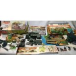 Selection of military related toys comprising Action Man, machine gun emplacement, Airfix coastal