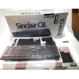 Sinclair QL computer with four Microdrive cartridges, boxed. Not available for in-house P&P