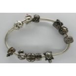 Pandora bracelet with ten charms, L: 19 cm, 50g. UK P&P Group 0 (£6+VAT for the first lot and £1+VAT