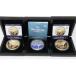 Two D-Day 75th anniversary commemorative five crown coins and The Normandy Drop five crown coin, all