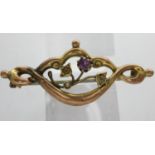 9ct gold Art Nouveau style brooch set with amethyst, lacking two stones, L: 45 mm, 2.3g. UK P&P