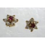 Pair of 9ct gold cluster stud earrings set with ruby and cubic zirconia, 0.63g. UK P&P Group 0 (£6+