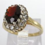 9ct gold cluster ring set with garnet and cubic zirconia, size J/K, 2.2g. UK P&P Group 0 (£6+VAT for