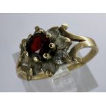 9ct gold cluster ring set with garnet and cubic zirconia, size M, 1.7g. UK P&P Group 0 (£6+VAT for