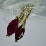 Pair of 10ct gold earrings set with ruby, H: 20 mm, 1.1g. UK P&P Group 0 (£6+VAT for the first lot