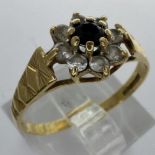 9ct gold cluster ring set with sapphire and cubic zirconia, size Q, 1.6g. UK P&P Group 0 (£6+VAT for