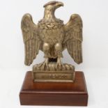 Napoleonic Wars: a large modern composition French Eagle, raised on a mahogany plinth, H: 27 cm.