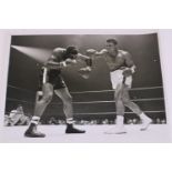 November 1965 press photograph of Cassius Clay V Floyd Patterson, 25 x 18 cm. UK P&P Group 1 (£16+