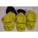 Six motorsport baseball caps, including three Dunlop examples each pen-signed by Murray Walker and