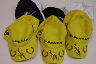 Six motorsport baseball caps, including three Dunlop examples each pen-signed by Murray Walker and