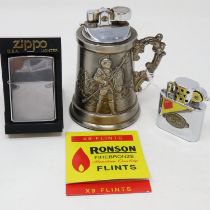 Novelty table lighter in the form of a beer stein, a Ronson storm lighter and a boxed Zippo lighter.