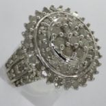 Sterling silver and 1.00ct natural diamond cluster ring, size M, 5.3g. P&P Group 1 (£14+VAT for