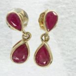 Pair of 9ct gold drop earrings set with rubies, drop H: 17 mm, 1.4g. UK P&P Group 1 (£16+VAT for the