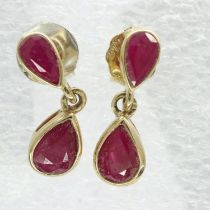 Pair of 9ct gold drop earrings set with rubies, drop H: 17 mm, 1.4g. UK P&P Group 1 (£16+VAT for the